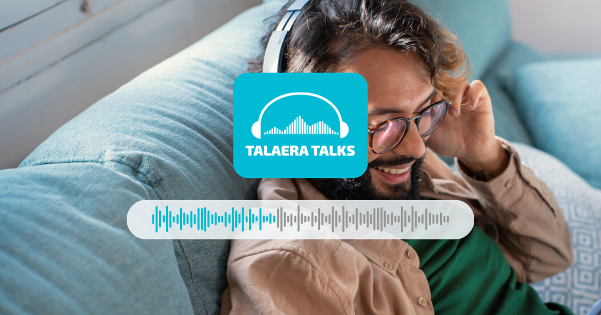 Man with headphones smiling on a light blue couch, listening to Talaera Talks podcast. Visual waveform overlayed, cozy ambiance.