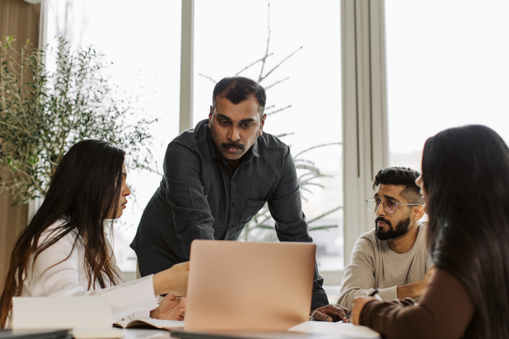 a team discussing a project at the office